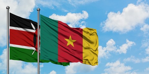 Kenya and Cameroon flag waving in the wind against white cloudy blue sky together. Diplomacy concept, international relations.