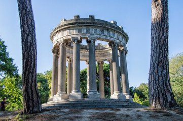 Neoclassical style gazebo in the park of Capricho in Madrid. Spain.