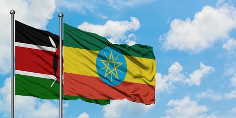 Kenya and Ethiopia flag waving in the wind against white cloudy blue sky together. Diplomacy concept, international relations.