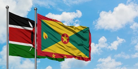 Kenya and Grenada flag waving in the wind against white cloudy blue sky together. Diplomacy concept, international relations.