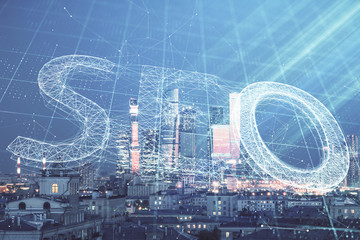 Double exposure of seo drawing on cityscape background. Concept of data search optimization engine