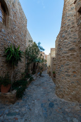 Romantic fortified greek village on rock island Monemvasia at sunset