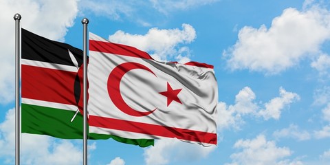Kenya and Northern Cyprus flag waving in the wind against white cloudy blue sky together. Diplomacy concept, international relations.