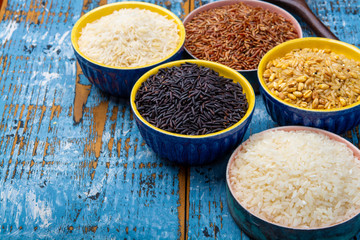 Different types of rice, white basmati, jasmine, arborio, brown and black
