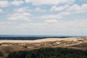 Parnidis dune in Nida. The Curonian Spit. Sand and Grass. People Walking On the Sand Dunes Images. Baltic Sea