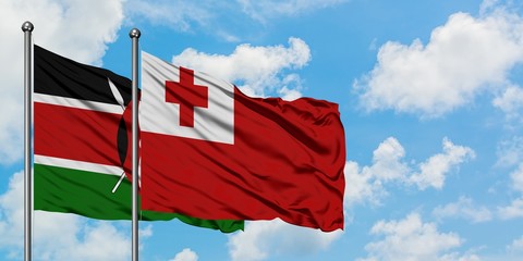 Kenya and Tonga flag waving in the wind against white cloudy blue sky together. Diplomacy concept, international relations.