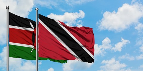 Kenya and Trinidad And Tobago flag waving in the wind against white cloudy blue sky together. Diplomacy concept, international relations.