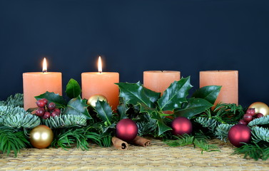 Naklejka na ściany i meble warm candlelight for advent and christmas