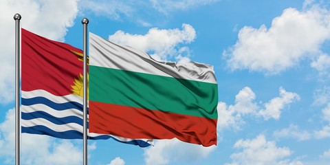 Kiribati and Bulgaria flag waving in the wind against white cloudy blue sky together. Diplomacy concept, international relations.