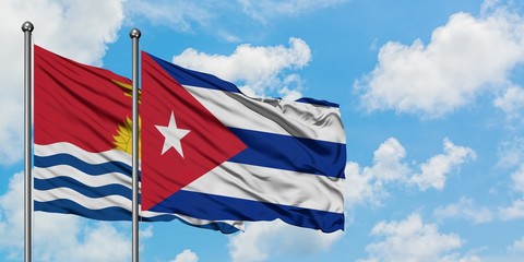 Kiribati and Cuba flag waving in the wind against white cloudy blue sky together. Diplomacy concept, international relations.