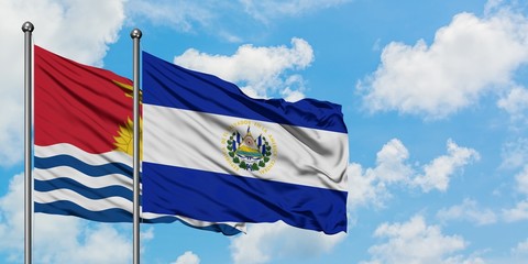 Kiribati and El Salvador flag waving in the wind against white cloudy blue sky together. Diplomacy concept, international relations.