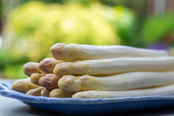 Fresh raw peeled white asparagus vegetables ready to cook