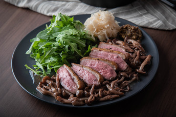grilled duck breast with mushroom sauce