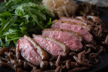 grilled duck breast with mushroom sauce