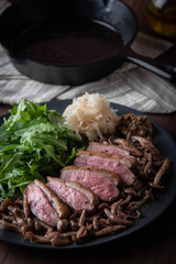 grilled duck breast with mushroom sauce