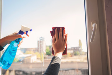 woman clean window