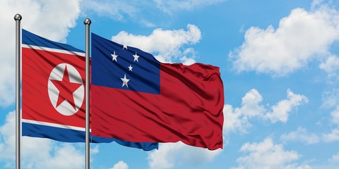 North Korea and Samoa flag waving in the wind against white cloudy blue sky together. Diplomacy concept, international relations.