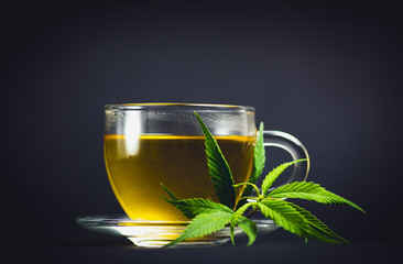 Marijuana herbal tea and cannabis leaves