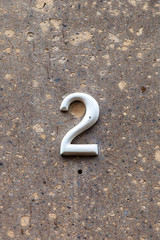 number two on granite wall