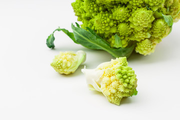 Fresh Romanesco cauliflower on the light background