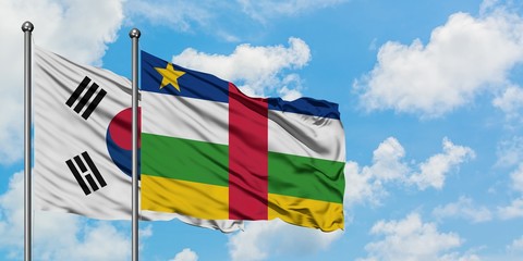 South Korea and Central African Republic flag waving in the wind against white cloudy blue sky together. Diplomacy concept, international relations.