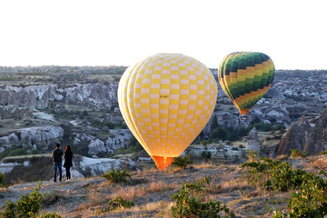 Göreme, Turkey - 09/18/2009: View from the observation deck of the village of Göreme on the flight of balloons over the valleys of Cappadocia.