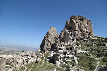 Uchisar, Turkey - 09/18/2009: Uchisar fortress carved into the rocks of Cappadocia.