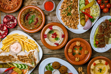 assorted Turkish dishes, hummus, muhamara, mutabal, falafel, shawarma