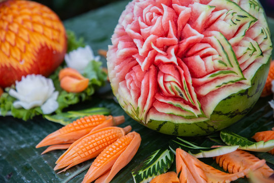 Fruit carving is the art of carving fruit