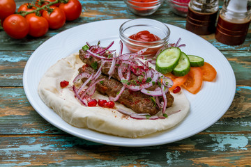 kafta in beirut on wooden table