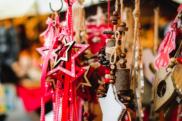 Festive decorations hanging on european Christmas market.
