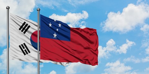 South Korea and Samoa flag waving in the wind against white cloudy blue sky together. Diplomacy concept, international relations.