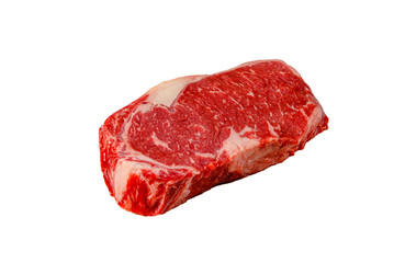 A rib eye steak of marbled grain-fed beef lies on a white background. Isolated.