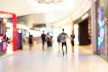 Blurred image of people shopping in department store