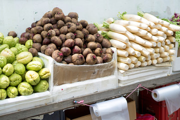 Fruit market with various colorful fresh fruits and vegetables