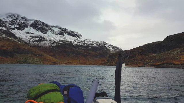 Exploring the beauty of nature with covered and uncovered mountains by snow together, A boat riding panoramic view with lake.