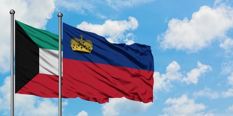 Kuwait and Liechtenstein flag waving in the wind against white cloudy blue sky together. Diplomacy concept, international relations.