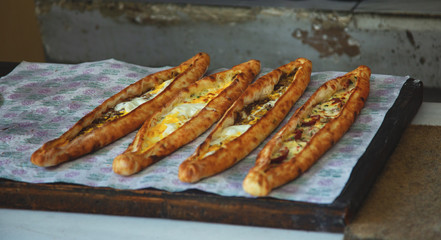 Traditional turkish baked dish pide in a bakery