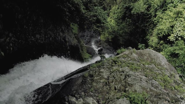 Waterfall in Bali Island tropical mountains 4K Drone flight