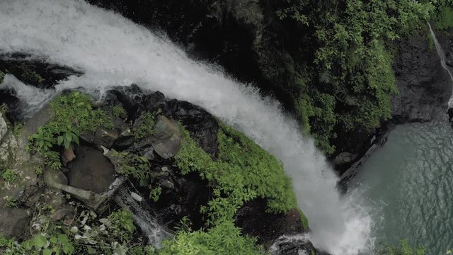 Waterfall in Bali Island tropical mountains 4K Drone flight