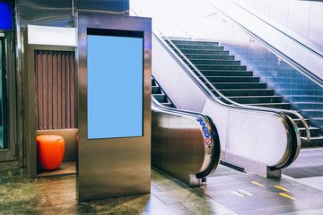 Clear Billboard in public place with blank copy space screen for advertising or promotional poster content, empty mock up Lightbox for information, blank display in station area with daylight © BullRun