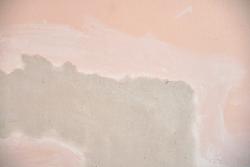 Recently plastered and smoothed out wall. Insurance fix of a pipe water leak. Professional work, unfinished.