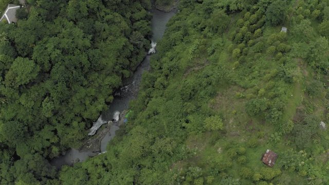 Waterfall in Bali Island tropical mountains 4K Drone flight