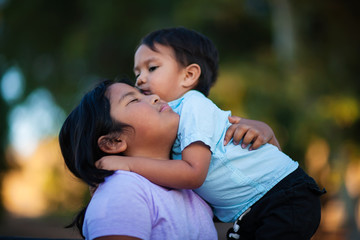 Siblings hug and embrace each other showing love, and affection, expressing that they will stand by each other.
