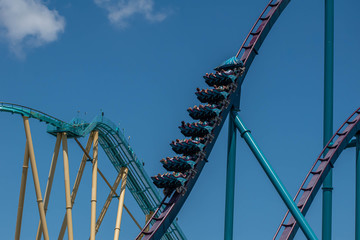 People screaming, laughing and enjoying rollercoaster 57.