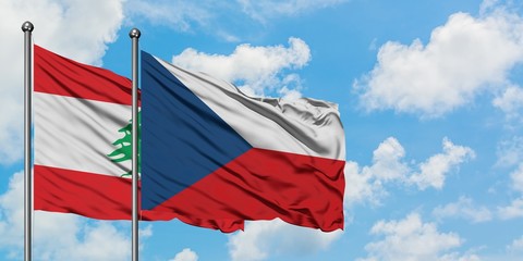 Lebanon and Czech Republic flag waving in the wind against white cloudy blue sky together. Diplomacy concept, international relations.