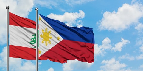 Lebanon and Philippines flag waving in the wind against white cloudy blue sky together. Diplomacy concept, international relations.