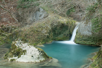 Fototapeta na wymiar Turquoise water pond in Urederra River, Navarra