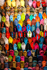 detail of slippers for sale in a shop of the souk market in Marrakesh, Morocco - 301020225