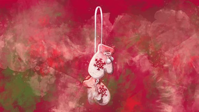 Watercolor Christmas decoration mittens on the back-ground of colored blots.